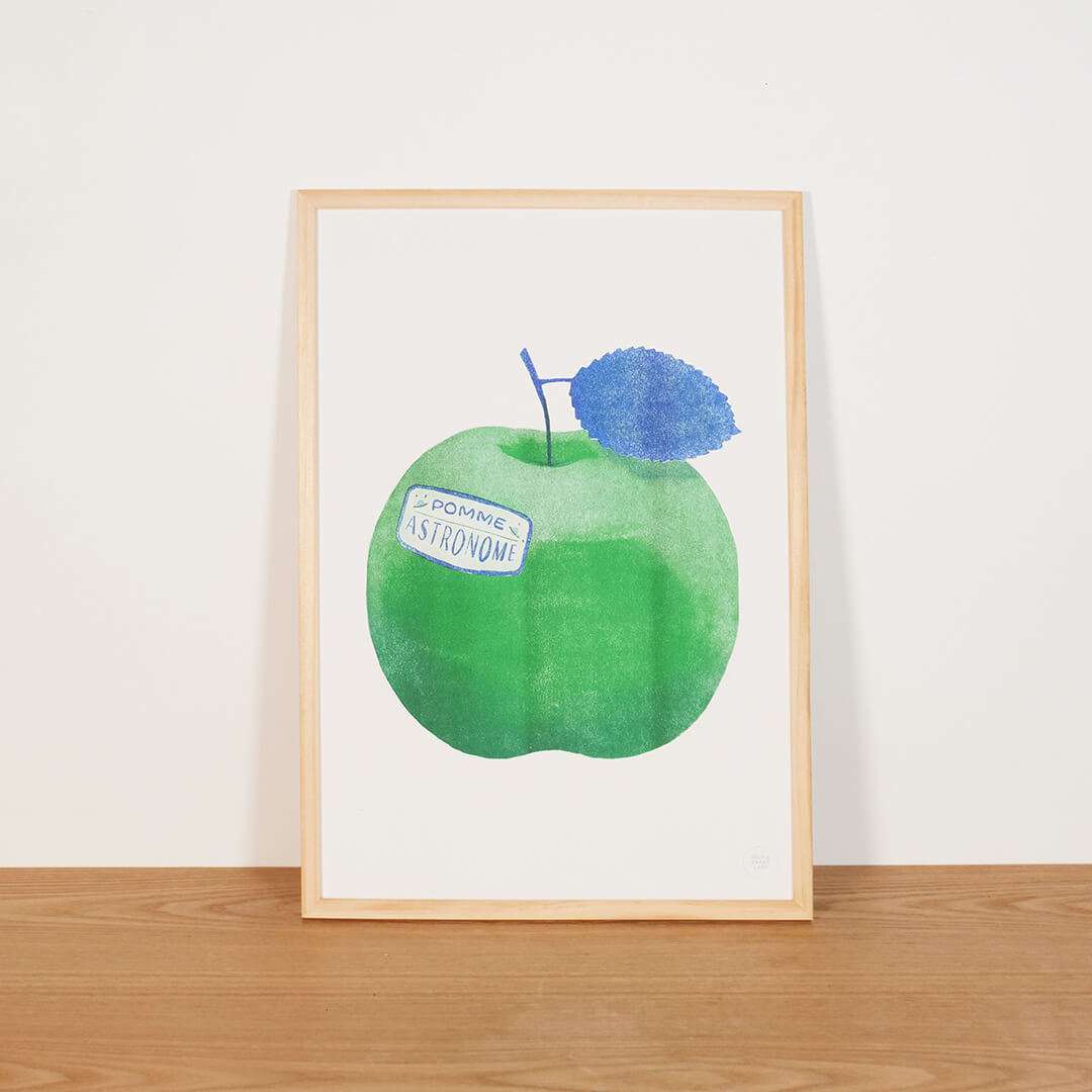 Photo d'une affiche décorative et originale de pomme dans un cadre